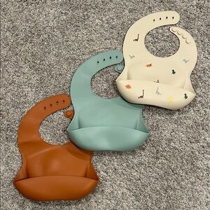 Mushie Silicone Baby Bib Set - Dinosaur Cream, Teal, and Clay